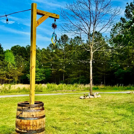 Chris handcrafted these charming lantern posts using whiskey barrels—just one of the many custom touches that make Busport feel like home.